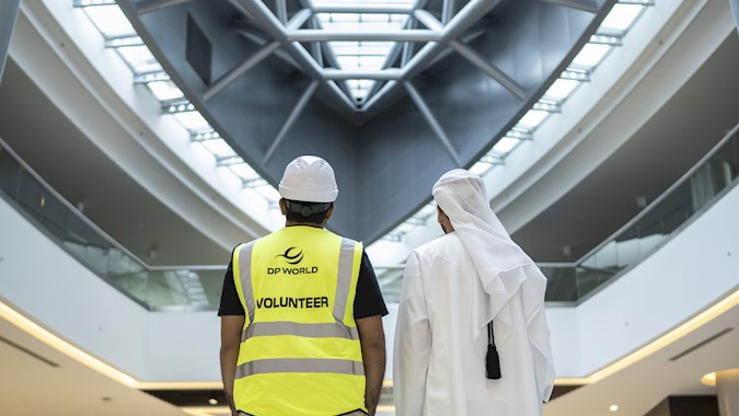 Employees standing infornt of camera