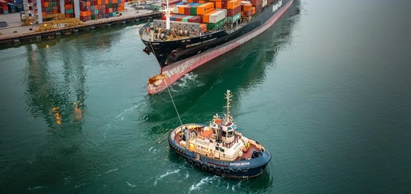 DP World port operations featuring container handling and vessel docking