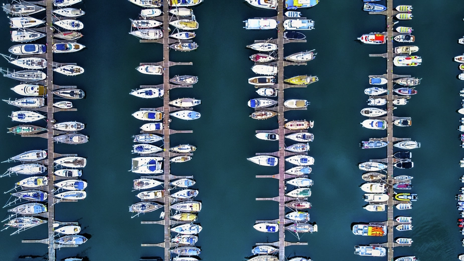 Aerial view of boats moored at harbor