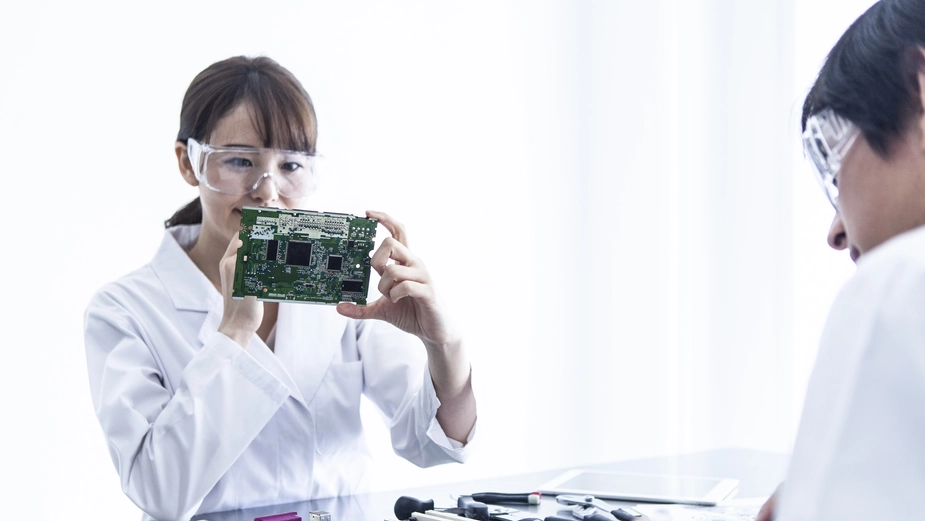 Technicians analyzing hardware as part of DP World’s tech innovation team