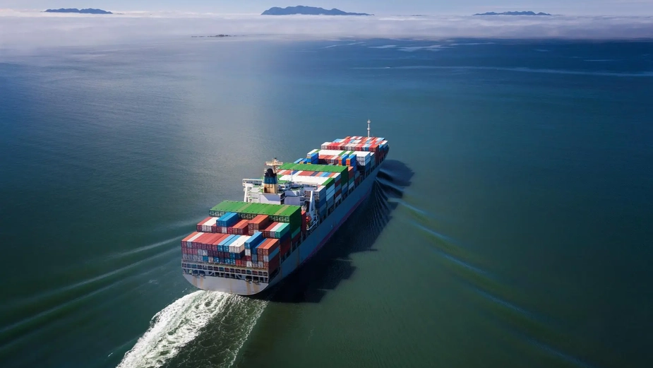 Cargo ship navigating open waters under DP World’s maritime operations
