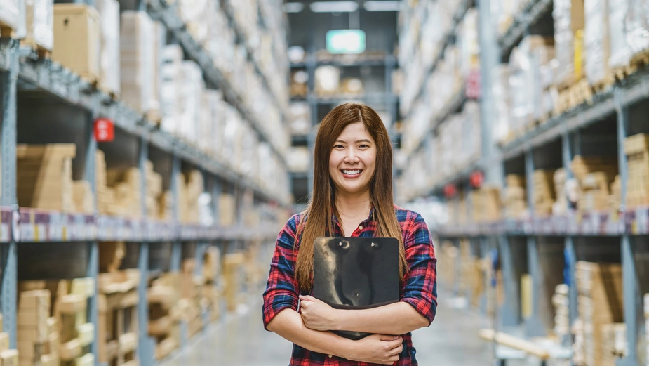 DP World female employee inside organized warehouse