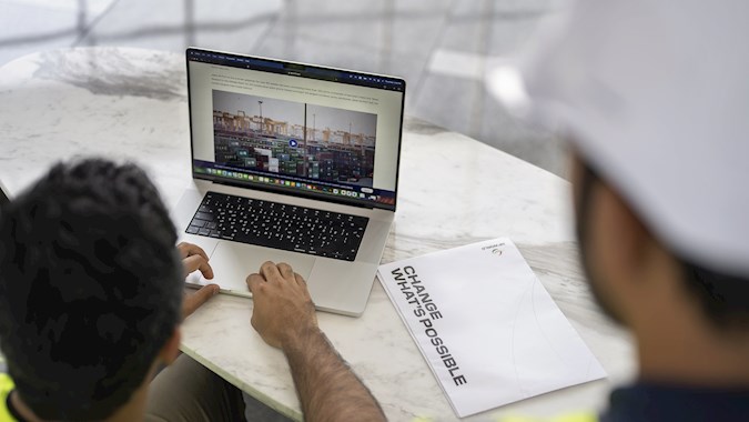Employees working on laptop