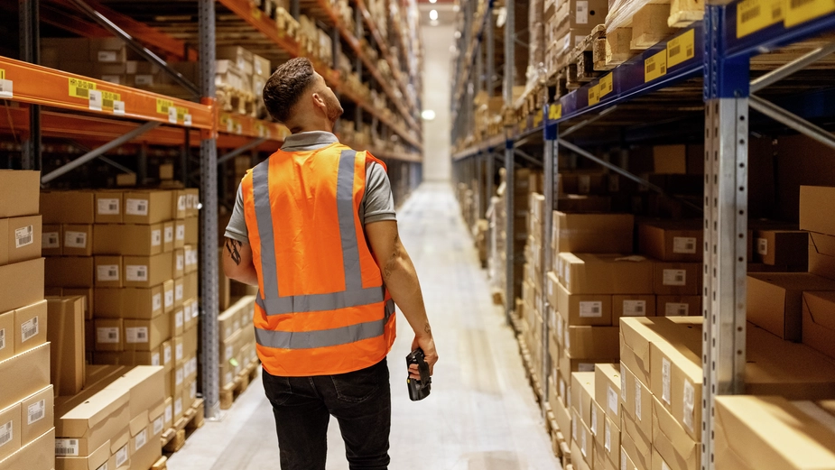 Warehouse worker managing inventory in a DP World distribution center